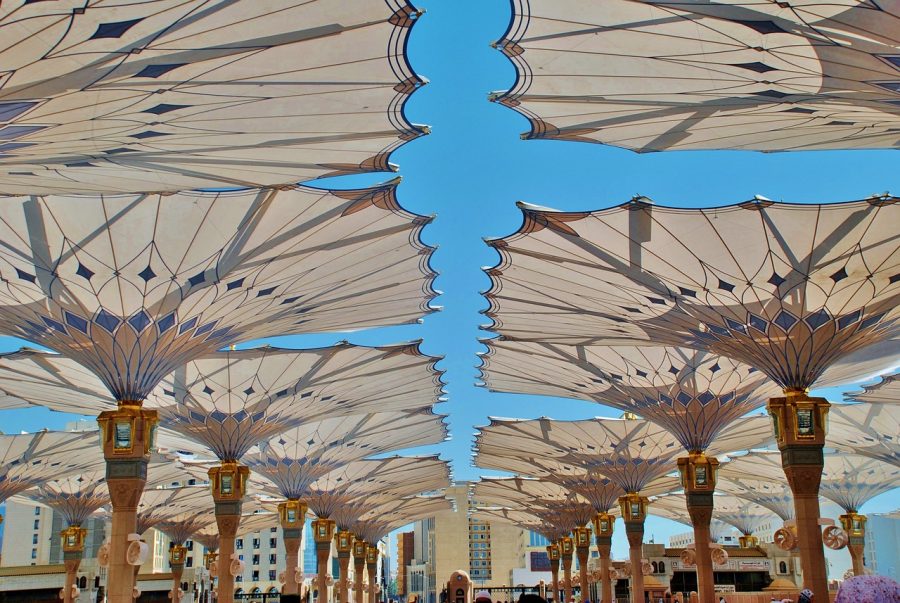 The piazza and shaded umbrella canopies outside Al-Masjid an-Nabawi, Madinah
